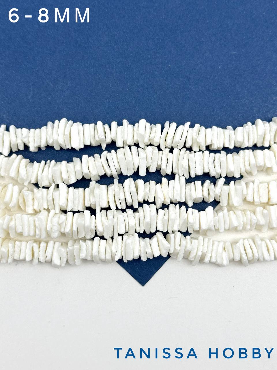 Ракушечник бусины фриформ, белый, 6-8мм, нить, ПМ110