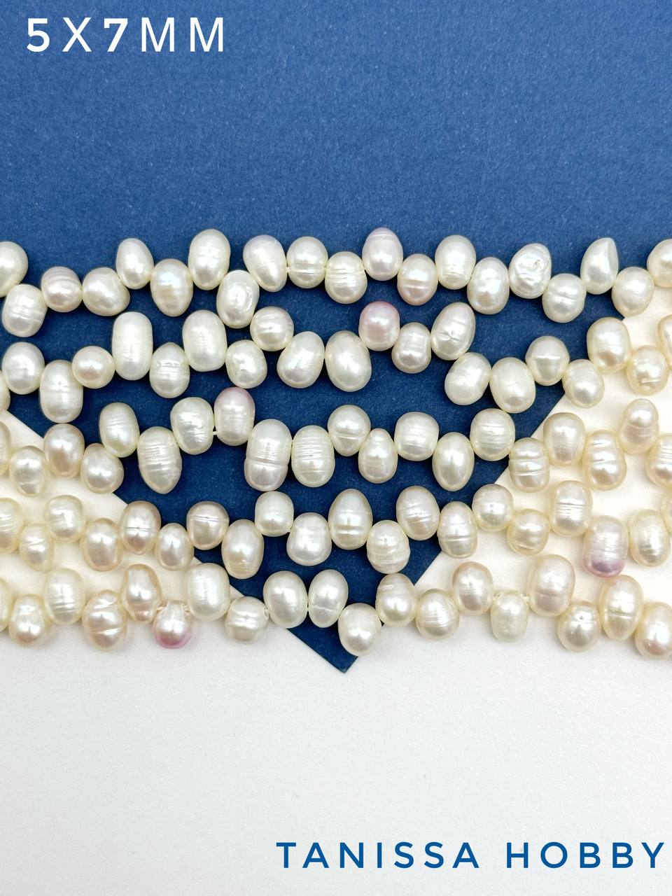 Жемчуг яйцо рис, разноцентровой, 5х7мм, А-, 1/2 нити, Ж083