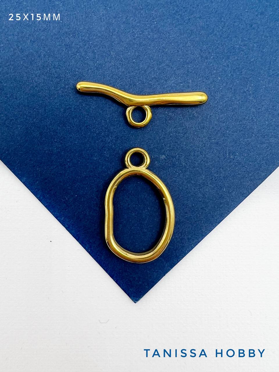 Тогл замок овал, 25х15мм, сталь с позолотой, Ч110